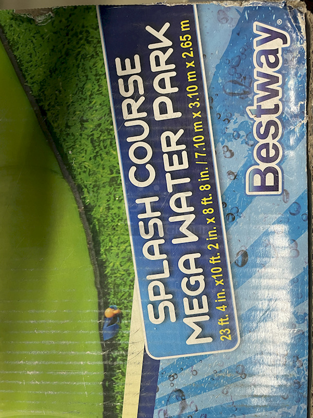H2O GO Inflatable Water Park With Water Slide – Over 23ft Long. Contains: 01 SLIDE; 01 BLOWER (STAKES INCLUDED); 01 REPAIR KIT (MULTIPLE ASSORTED PATCHES); 1 STORAGE BAG; 10 BOUNCER STAKES; 1 PUC BALL SPRINKLER; 06 SMALL FLAGS; 01 WATER SPRAYING HOSE. Overall: 23ft – 4in x 10ft – 2in x 8ft – 8in.  - Image 6 of 9
