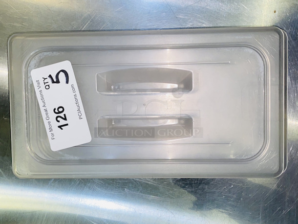 SWEET! Cambro High Temp Amber EN631-1 1/3 Pan Lids.  

5x Your Bid - Image 1 of 5
