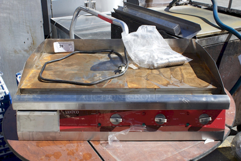 BRAND NEW SCRATCH AND DENT! 
Avantco EG30N 30" Electric Countertop Griddle - 208/240V, 3375W-4500W. Dent and Surface Rust From Rain. IN WORKING ORDER! 