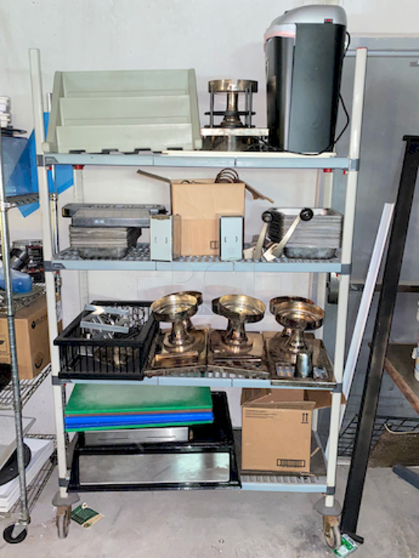 RACK FULL! Misc. Kitchen and Catering Equipment. Highlights include: Cutting Boards, Merchandiser, Paper Shredder, Commercial Can Openers, Cash Box and More. Rack Not Included.  - Image 1 of 4