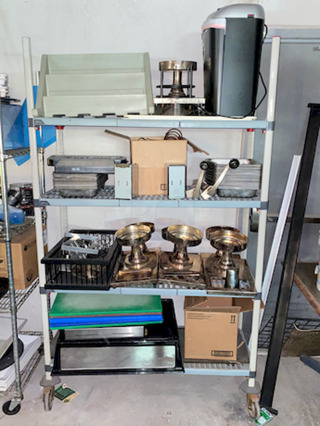 RACK FULL! Misc. Kitchen and Catering Equipment. Highlights include: Cutting Boards, Merchandiser, Paper Shredder, Commercial Can Openers, Cash Box and More. Rack Not Included. 