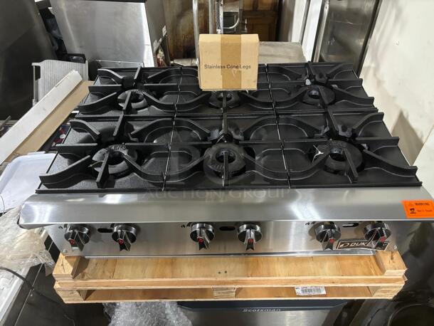 Dukers DCHPA36 36" Countertop Gas Hotplate with (6) Burners, Manual Controls, 168.000 BTU
 - Image 1 of 5