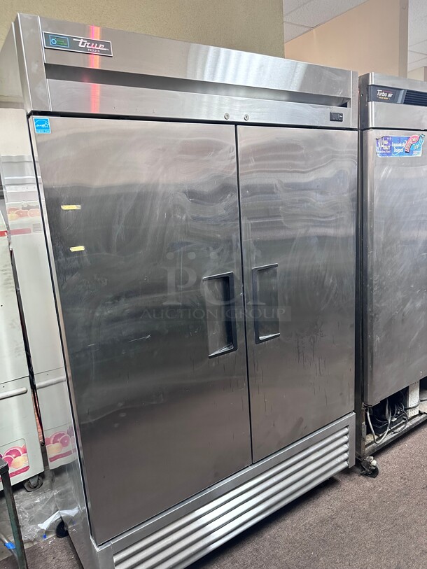 New True T-49F-HC 54 inch Two Section Reach In Freezer, (2) Solid Doors, 115v 