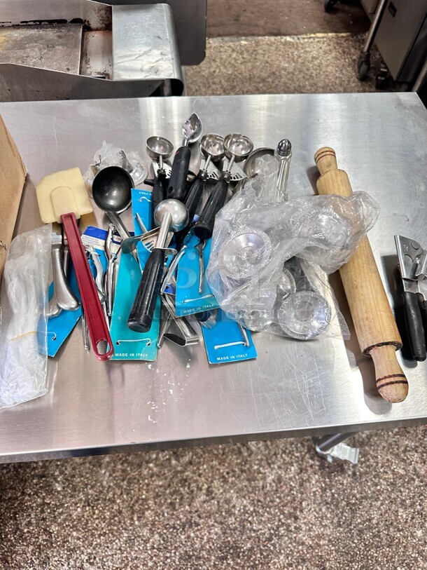 One Lot Of Misc Kitchen Items 
Ice Cream Scooper Table Holders Can Opener etc - Item #1113513