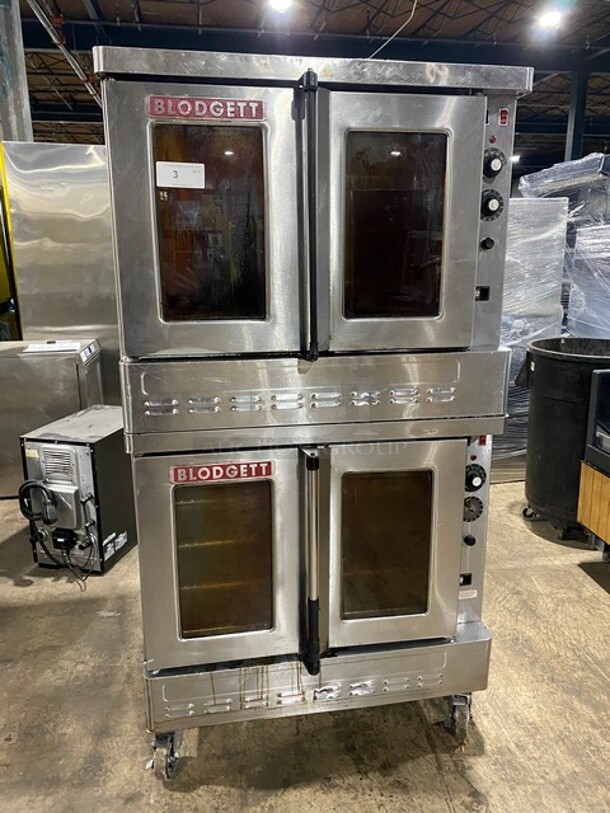 BEAUTIFUL! Blodgett Commercial Natural Gas Powered Double Stacked Convection Oven! With Metal Baking Racks! With View Through Doors! On Commercial Casters! All Stainless Steel! 2 X Your Bid! Makes One Unit! - Image 1 of 9