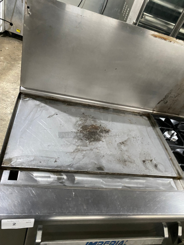 Sweet! Imperial Commercial Natural Gas Powered 6 Burner Stove With Left Side Flat Top Griddle! 2 Full Size Ovens Underneath! With Metal Oven Racks! Left Side Splash And Raised Back Splash!  All Stainless Steel! On Casters! - Image 6 of 11