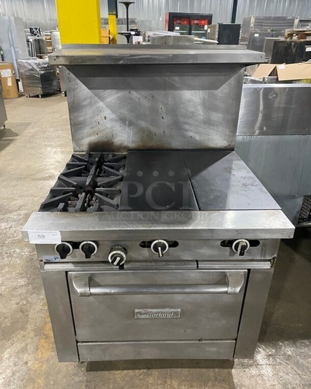 Garland Commercial Natural Gas Powered 2 Burner Stove With Hot Plate! With Oven Underneath! With Raised Back Splash And Salamander Shelf! All Stainless Steel! On Legs!