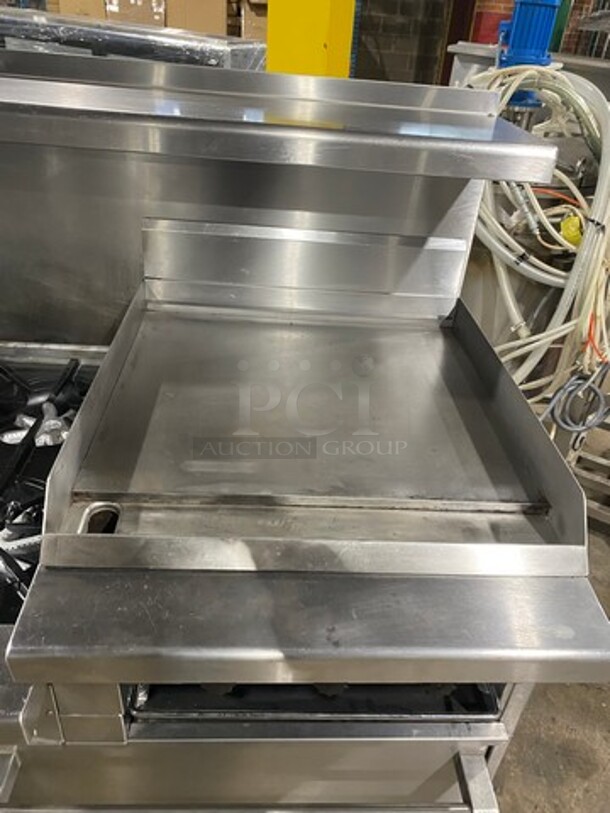 GREAT FIND! Garland Commercial Gas Powered 6 Burner Stove With Right Side Flat Griddle! Griddle Has Side Splashes! With Raised Back Splash And Salamander Shelf! With 2 Oven Underneath! Metal Oven Racks! All Stainless Steel! On Casters! - Image 9 of 11