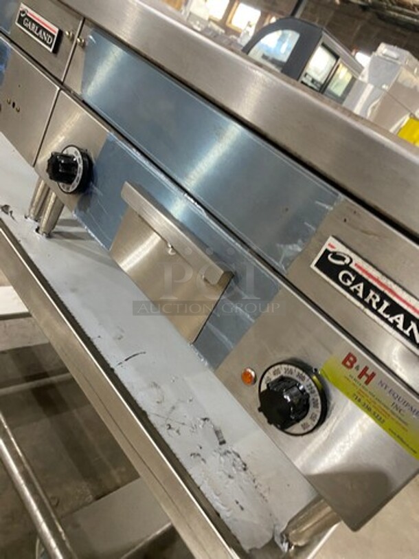 WOW! NEW! NEVER USED! Garland Commercial Countertop Electric Powered Flat Top Griddle! With Back And Side Splashes! On Legs! On Equipment Stand! All Stainless Steel! On Casters! Model: E2448G SN: 0404ME0033 208V 60HZ 3 Phase - Image 6 of 9