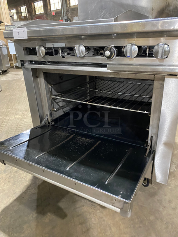AMAZING! Therma Tek Commercial Natural Gas Powered Flat Top Griddle! With Right Side 2 Burners! Griddle Has Side Splashes! Raised Backsplash And Salamander Shelf! With Oven Underneath! Metal Oven Rack! All Stainless Steel! On Casters! - Image 9 of 11