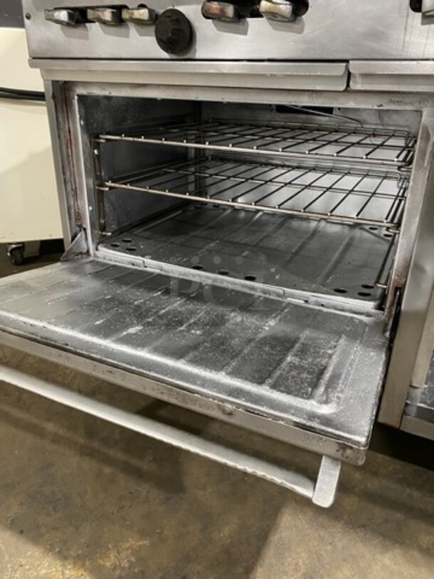 Garland Commercial Gas Powered 8 Burner Stove! With Raised Back Splash And Salamander! With Oven Underneath! All Stainless Steel! On Casters! - Image 7 of 11