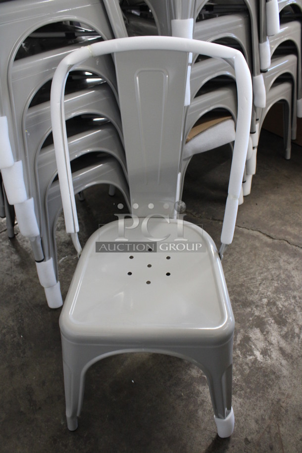 4 BRAND NEW! Silver Metal Tolix Dining Chairs. Stock Picture - Cosmetic Condition May Vary. 17x18x34. 4 Times Your Bid!