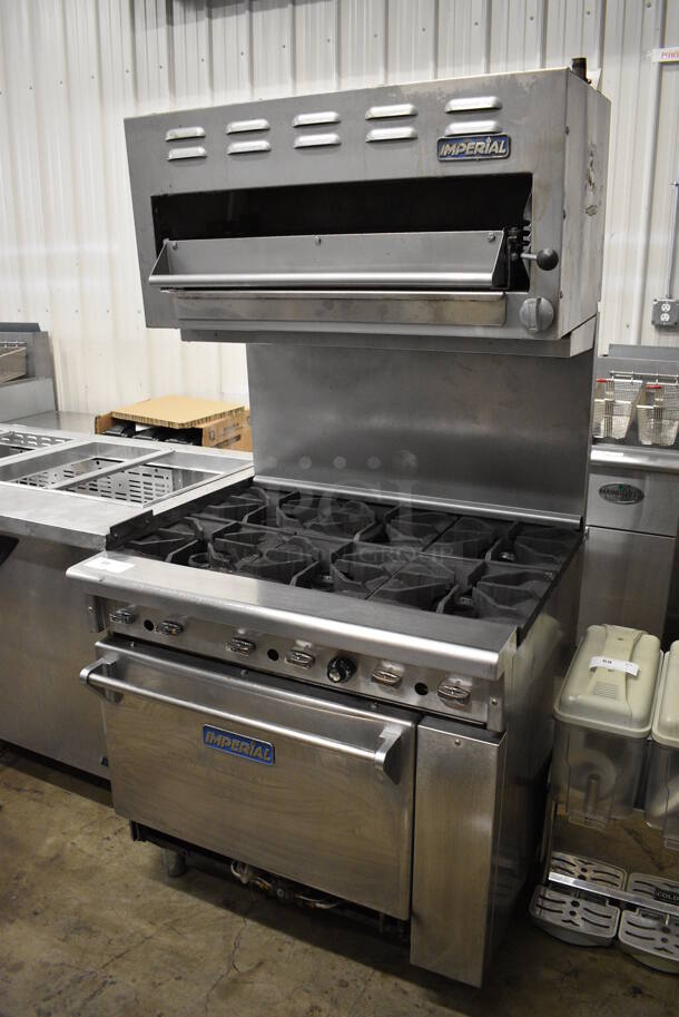 Imperial Stainless Steel Commercial Natural Gas Powered 6 Burner Range w/ Oven and Salamander Cheese Melter. 36x34x71