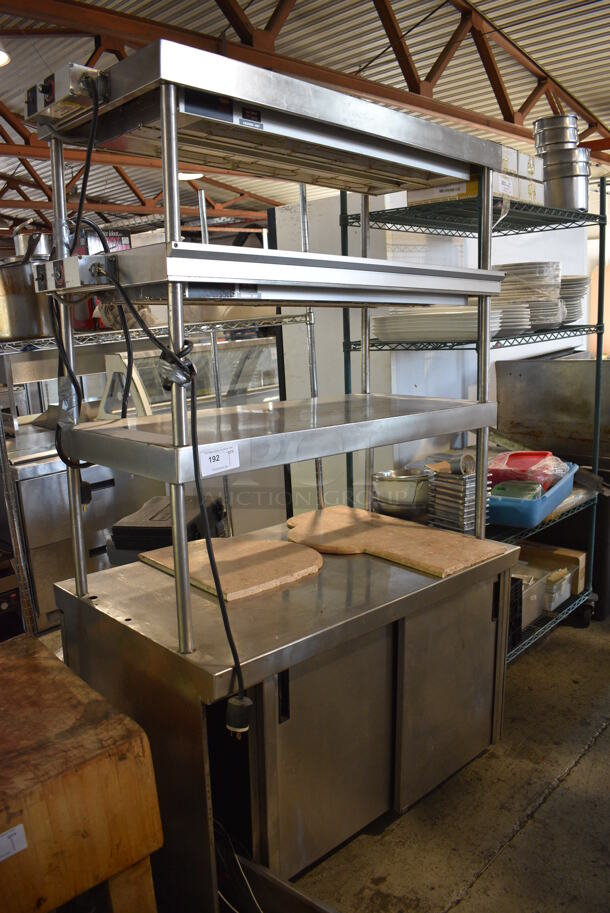 Randell Stainless Steel Commercial Counter w/ 2 Over Shelves, 2 Warming Strips and 2 Doors. 48x30x82