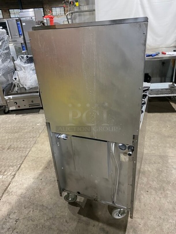 Commercial Natural Gas Powered 4 Burner Stove! With Raised Back Splash! With Oven Underneath! Stainless Steel Body! On Casters! - Image 4 of 10