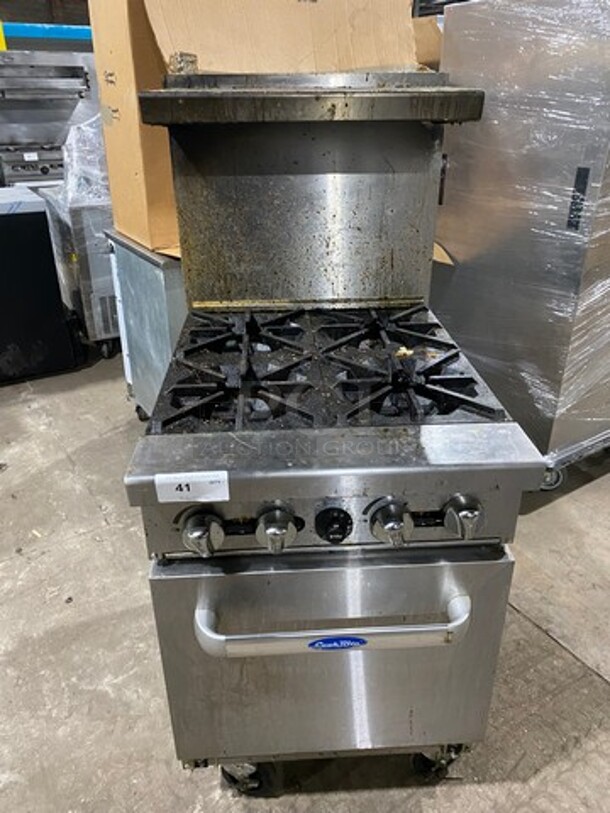 Cook Rite Commercial Natural Gas Powered 4 Burner Stove! With Raised Back Splash And Salamander Shelf! With Oven Underneath! All Stainless Steel! On Casters! - Image 1 of 9