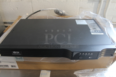 BRAND NEW IN BOX! Tripp-Lite Smart500RT1U Interactive UPS System. 