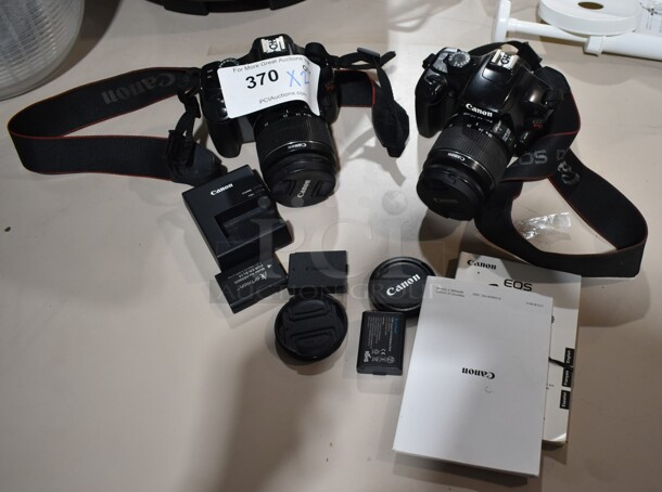 2 Canon Rebel T3 Digital Cameras w/ Lens and Strap. Comes w/ 3 Battery, 1 Charger, 2 Lens Caps. 2 Times Your Bid!