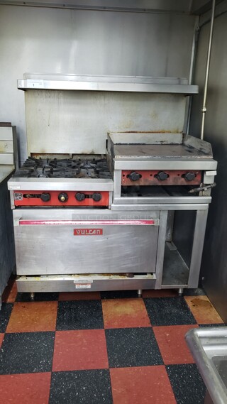 Vulcan 148L 48" 4 Burner Gas Range w/ Griddle/Broiler & (1) Standard Oven, Natural Gas. Missing one knob  Not tested  (Location 2)