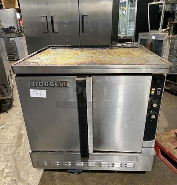 Blodgett Stainless Steel Commercial Full Size Convection Oven w/ Solid Doors, Metal Oven Racks and Thermostatic Controls.