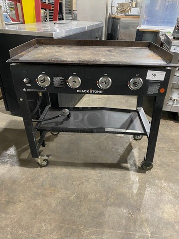 Blackstone LP Powered Outdoor Flat Top Griddle! With Storage Space Underneath! On Casters! Model: 1554