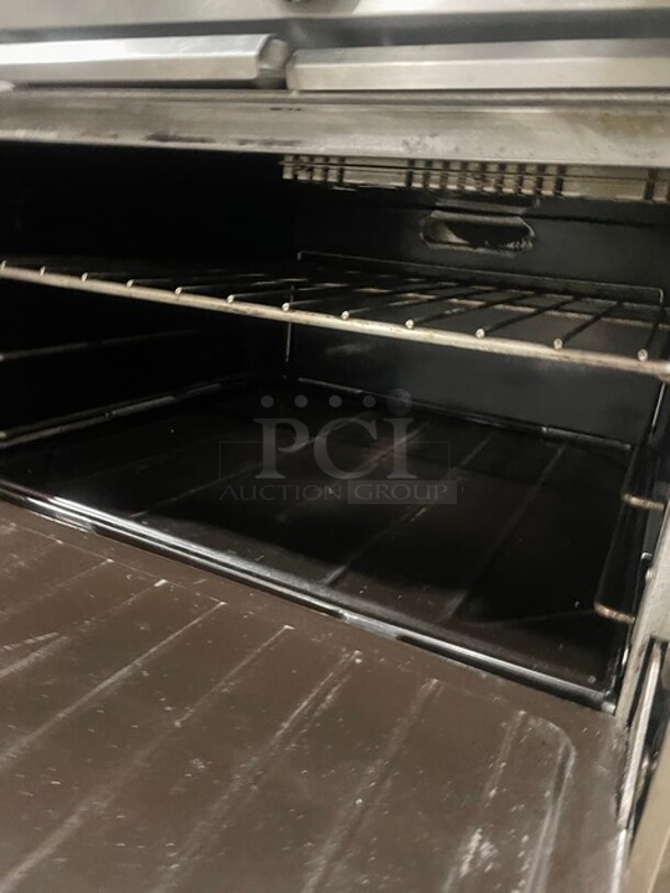 AMAZING! Garland Natural Gas Powered 10 Burner Stove! With 2 Standard Ovens Underneath! With Back Splash & Overhead Salamander Shelf! All Stainless Steel! On Casters! Model: G60-10RR! - Image 8 of 10