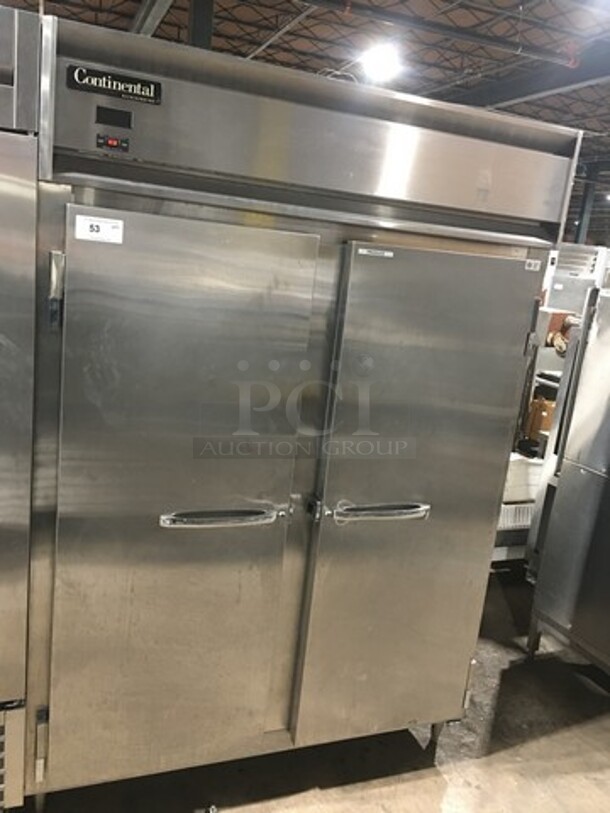Continental Commercial 2 Door Reach In Cooler! Poly Coated Racks! All Stainless Steel! On Legs! Model: DL2RESS SN: 15528919 115V 60HZ 1 Phase