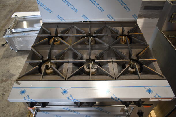 BRAND NEW SCRATCH AND DENT! Vulcan 36C-6BN Stainless Steel Commercial Natural Gas Powered 6 Burner Range w/ Convection Oven, Over Shelf and Back Splash. Stock Picture Used as Gallery. - Image 2 of 12