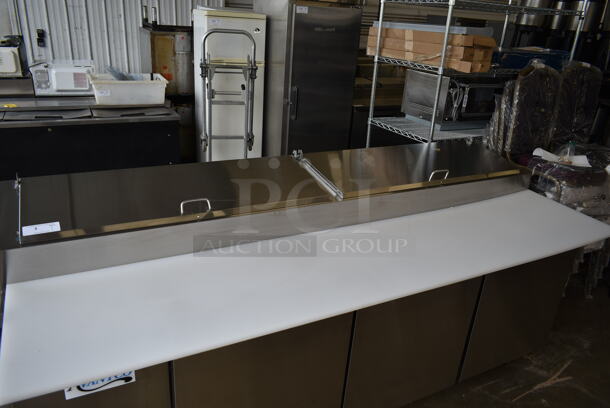 BRAND NEW SCRATCH AND DENT! 2023 Avantco 178SSPPT3 Stainless Steel Commercial Refrigerated Pizza Prep Table on Commercial Casters. 115 Volts, 1 Phase. Tested and Working! - Image 4 of 12
