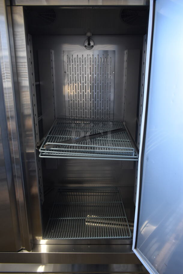 BRAND NEW SCRATCH AND DENT! 2023 Avantco 178SS3FHC Stainless Steel Commercial 3 Door Reach In Freezer w/ Poly Coated Racks and Commercial Casters. 115 Volts, 1 Phase. Stock Picture Used as Gallery. Tested and Working! - Image 10 of 12