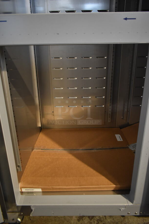 BRAND NEW SCRATCH AND DENT! 2016 Hoshizaki CR2S-HS Stainless Steel Commercial 4 Half Size Door Reach In Cooler on Commercial Casters. 115 Volts, 1 Phase. Tested and Working! - Image 5 of 10