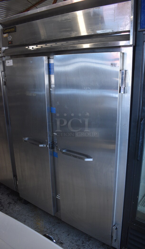 Continental Model 2R Stainless Steel Commercial 2 Door Reach In Cooler on Commercial Casters. 115 Volts, 1 Phase. 52x34x82. Tested and Powers On But Does Not Get Cold 