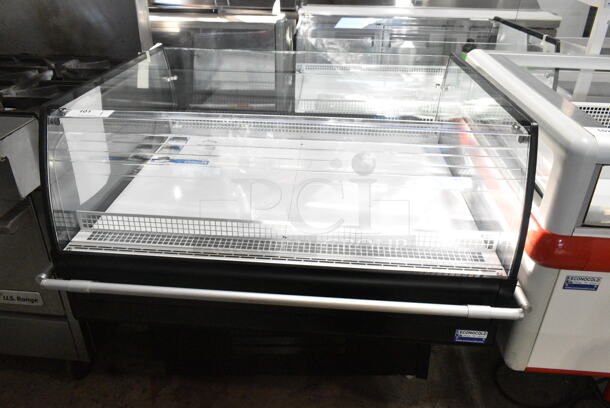 BRAND NEW SCRATCH AND DENT! Econocold OM-IRSSCG Metal Commercial Floor Style Self Contained Island Fridge Curved Glass on Commercial Casters. 115 Volts, 1 Phase. Tested and Working! - Image 1 of 5