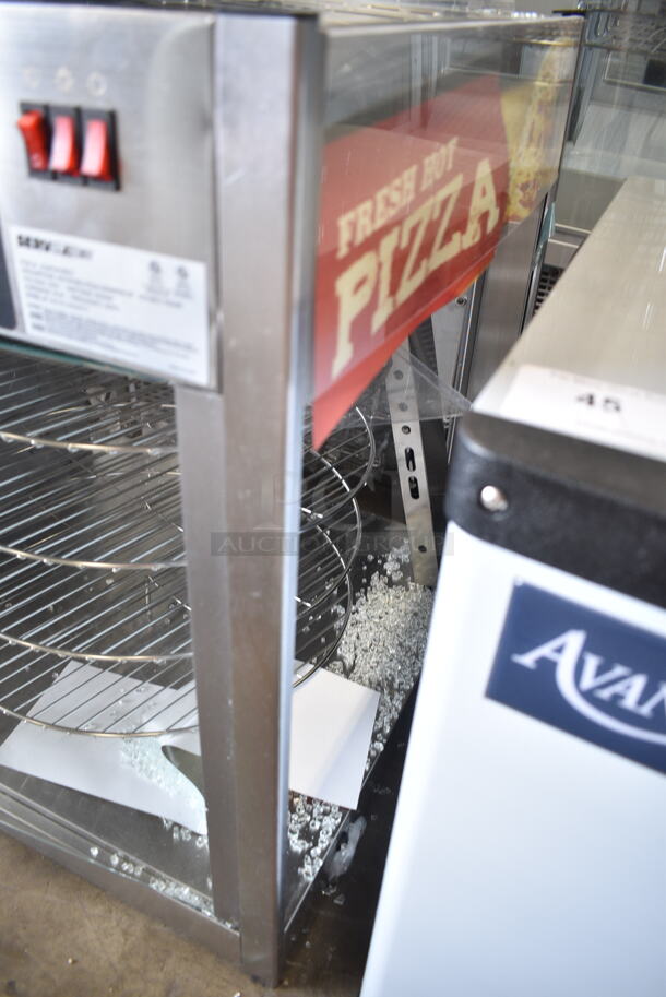 BRAND NEW SCRATCH AND DENT! ServIt 423PDW18D2 Stainless Steel Commercial Countertop Self-Service Pizza Warmer with 4-Shelf Rotating Rack. See Pictures for Broken Glass. 120 Volts, 1 Phase. Tested and Working! - Image 4 of 8
