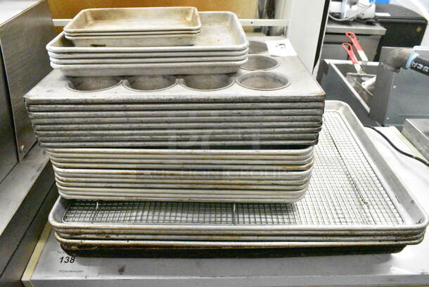 35 Various Metal Items Including Baking Pans and Muffin Baking Pans. 35 Times Your Bid!  - Image 1 of 7