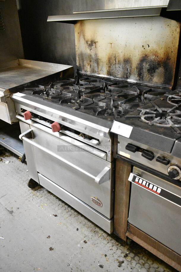 Dynamic Cooking Systems Stainless Steel Commercial Natural Gas Powered 6 Burner Range w/ Oven, Over Shelf and Back Splash. This Unit Was In Working Condition When the Restaurant Closed. (kitchen) - Image 6 of 6