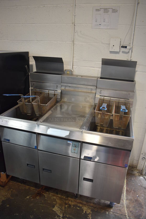 Pitco Frialator Model F14S-V Stainless Steel Commercial Floor Style Propane Gas 2 Bay Fryer w/ Center Dumping Station on Commercial Casters. 110,000 BTU. 49x32x54 - Image 2 of 9