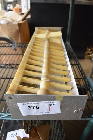 Metal Sticker Roll Holder. 26x7.5x4