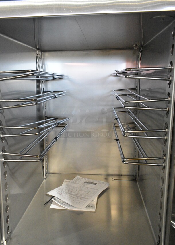 BRAND NEW SCRATCH AND DENT! 2024 Alto Shaam 1200-UP Stainless Steel Commercial Mobile 16 Pan Dutch Door Holding Cabinet with Universal Racks on Commercial Casters. 120 Volts, 1 Phase. Tested and Working! - Image 7 of 9