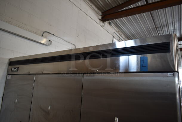 2020 Migali C-3FB-HC Stainless Steel Commercial 3 Door Reach In Freezer w/ Poly Coated Racks on Commercial Casters. 115/208-240 Volts, 1 Phase. Tested and Working! - Image 2 of 9