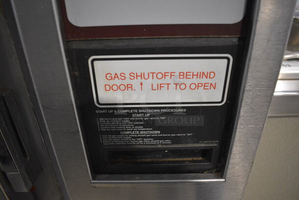 Stainless Steel Commercial Gas Powered Mini Rotating Rack Oven w/ View Through Doors and Lower Pan Rack on Commercial Casters. 48x36x75. Picture of the Unit Powered On Before Removal Is Included In the Listing. - Image 4 of 11
