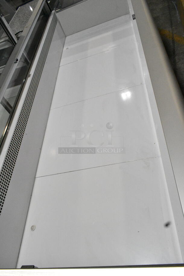 BRAND NEW SCRATCH AND DENT! Econocold OM-EIF/CF100 Metal Commercial Floor Style Self Contained Island Fridge. 115/220 Volts, 1 Phase. Tested and Does Not Power On - Image 5 of 7