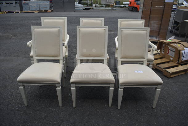 6 Cream Colored Wooden Style Dining Chairs With Both Cream Colored Back And Seat Cushions. 2 Chairs With Arms, And 4 Chairs Without Arms. 6 Times Your Bid! Cosmetic Condition May Vary.  - Image 1 of 3