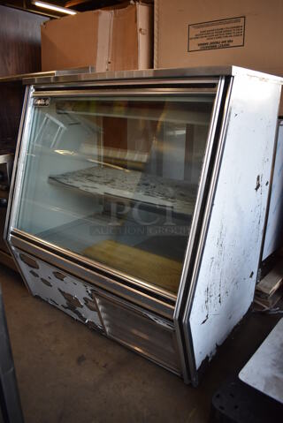 2011 Leader HDL48S/C Metal Commercial Deli Display Case Merchandiser. 115 Volts, 1 Phase. 48x33x52.5. Tested and Powers On But Temps at 52 Degrees