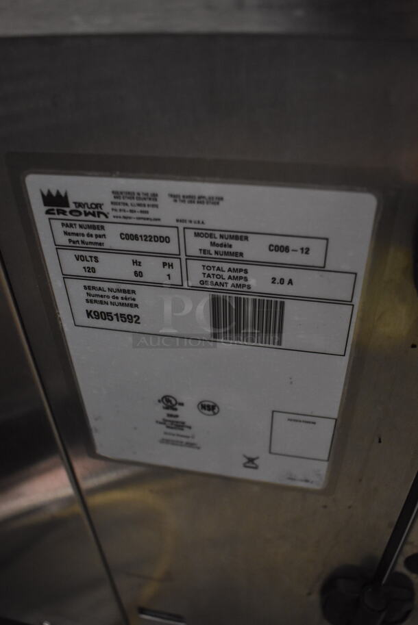 Taylor C006-12 Commercial Stainless Steel Countertop 9 Flavor Shot Dispenser On Black Legs. 120V, 1 Phase.  - Image 6 of 6