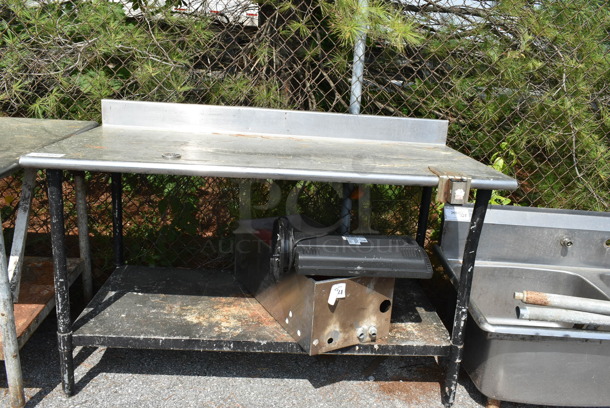Stainless Steel Table w/ Back Splash and Metal Under Shelf.  - Image 1 of 1