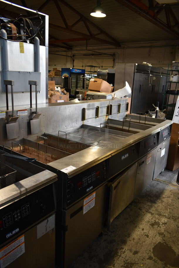Giles EOF-24 Stainless Steel Commercial Electric Powered 3 Bay Fryer w/ Giles EOF-BIB Dumping Station. 480 Volts, 3 Phase.
