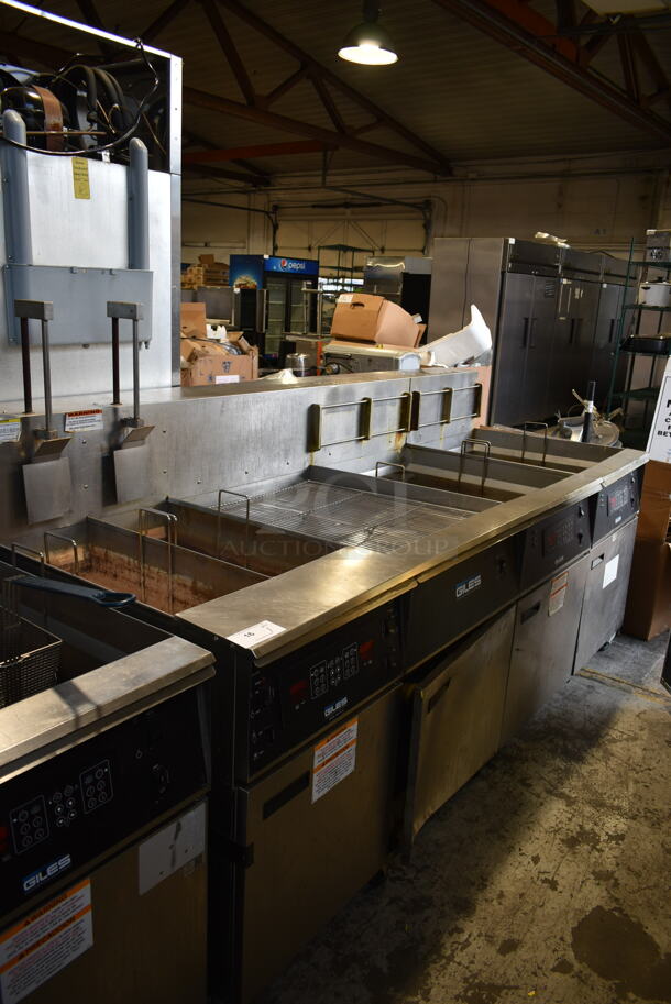 Giles EOF-24 Stainless Steel Commercial Electric Powered 3 Bay Fryer w/ Giles EOF-BIB Dumping Station. 480 Volts, 3 Phase.
 - Image 1 of 9