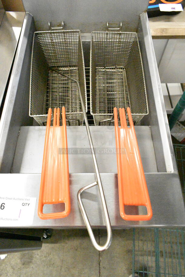 2022 Sierra FRYSTAR500 Stainless Steel Commercial Floor Style Natural Gas Powered Deep Fat Fryer w/ 2 Metal Fry Baskets on Commercial Casters.  - Image 3 of 7