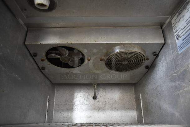 Continental 1R Stainless Steel Commercial Single Door Reach In Cooler w/ Racks on Commercial Casters. 115 Volts, 1 Phase. Tested and Working! - Image 6 of 7